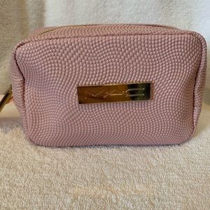 NEW. MAC cosmetics pink/gold textured small 6”x4”x3” travel case. Smoke free